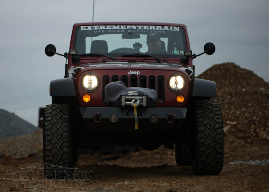 JK Wrangler at Construction Site with Headlights On