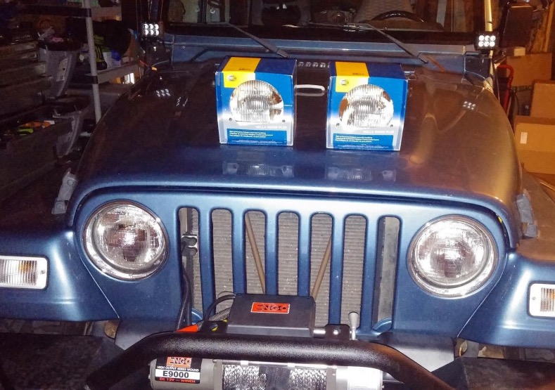 How to install a Hella Vision Plus 7 in. Round H4 Conversion Headlamp on  your 1997-2006 Jeep Wrangle | ExtremeTerrain