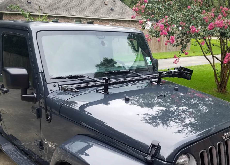 Emergency Recovery Jack Mounted on the Hood of a JK Wrangler